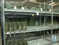 high density parachute storage saves floor space while organizing military parachute gear