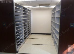 Storage Shelves that Move on Floor Tracks Storage Shelves that Move and Condense on Floor Tracks