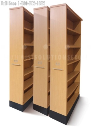high density roll-out music storage shelving units on tracks