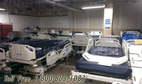 broken beds kept in a biomedical equipment storage room