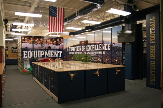 spacesaver mobile shelving for athletic equipment with designer end panels