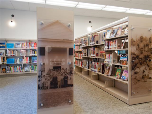 library cantilever shelving includes custom end panels with historical pictures