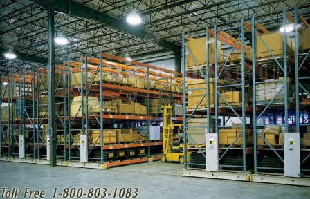 moving pallet shelf storage systems save space in warehouses and increase productivity