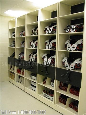 rolling high density storage system with custom end panels for extra football gear storage