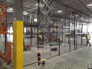 wire partition cages provide secure inventory storage for distribution center