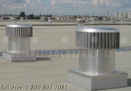 wind-driven roof turbines exhaust hot air & pollutants