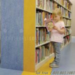 Library shelving custom carpet end panel design