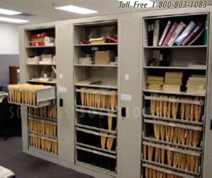 pivoting file cabinet shelving