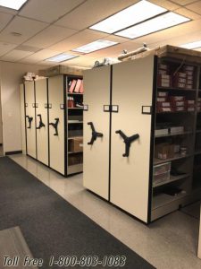 High density movable shelving systems