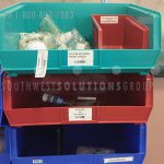 Adjustable shelving plastic bins frameworks medical supplies