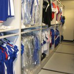 Athletics uniform storage game day gear hanging uniforms