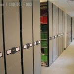 Book storage powered mobile shelving system