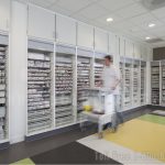 Built in medical supply room cabinet basket shelves