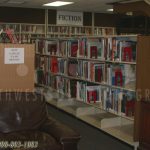 Carpet replacement fully loaded library shelving relocation