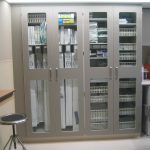 Catheter cabinet rack pull out access