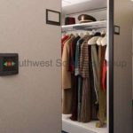 Clothes hanging storage powered mobile system
