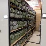 Compact military flight crew equipment storage