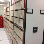 Death records stored on powered mobile shelving vital statistics stacks 1