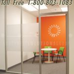 Demountable architectural glass office walls on carpet tile