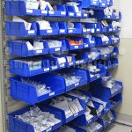 Dialysis equipment plastic bin supply storage wall shelf