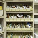Drug flow bin shelving medical supply storage