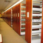 Electic compact push button shelving book storage