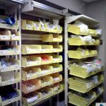 Ez rail applications healthcare trauma unit sterile supplies installed loaded framewrx sliding shelving