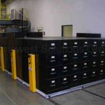 File cabinets on tracks rolling hand crank shelving