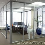 Floor to ceiling glass office walls on carpet tile