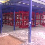Freestanding mezzanine structural storage over shelving warehouse storage