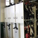 Golf bag storage hand crank system