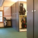 Golf bag storage system motorized mobile shelving