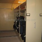 Golf bag storage system sliding racks