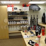 Golf gear storage shelving hanging athletic garment