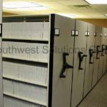 Gsa high density binder shelving military rolling compact racks on tracks spacesaver cabinets