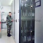 Gsa weapons racks military armory cabinets on tracks spacesaver powered storage shelving