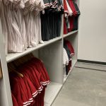 Hanging baseball jersey storage shelves