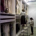 Hanging clothing museum storage dress artifact collection