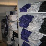 Hanging team uniform racks space saving equipment shelves