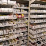 High density framewrx shelving sliding bin storage pharmacies