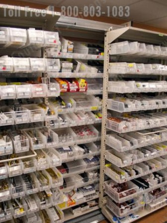 https://www.southwestsolutions.com/wp-content/uploads/2021/03/high-density-framewrx-shelving-sliding-bin-storage-pharmacies.jpg