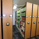 High density mobile automatic library reference storage