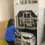 Hospital bed vertical storage lifts gurney