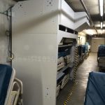 Hospital bed vertical storage lifts motorized stretchers