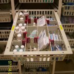 Hospital medical supply tilt bin basket storage
