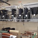 Hospital wheelchair electric wall rack storage