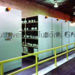 Industrial powered compact storage racks lean material handling