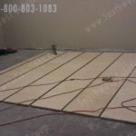 Installation high capacity storage shelving floor tracks