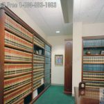 Law library book shelving wood trim cladding