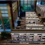 Lighting on stacks ranges shelving in library over aisles view books easier